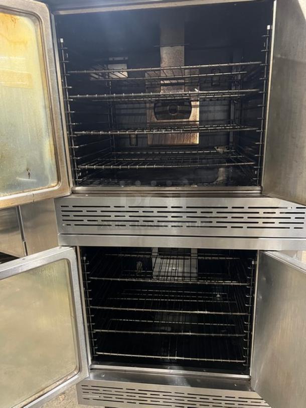 Imperial commercial stainless steel double-stacked convection oven; natural gas, wired racks, on casters, used condition.