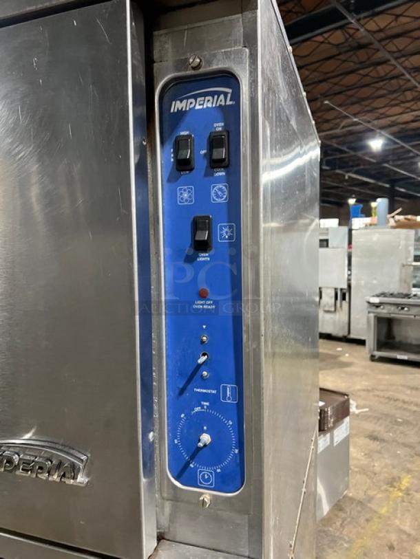 Imperial commercial stainless steel double-stacked convection oven, natural gas, on casters, control panel visible.