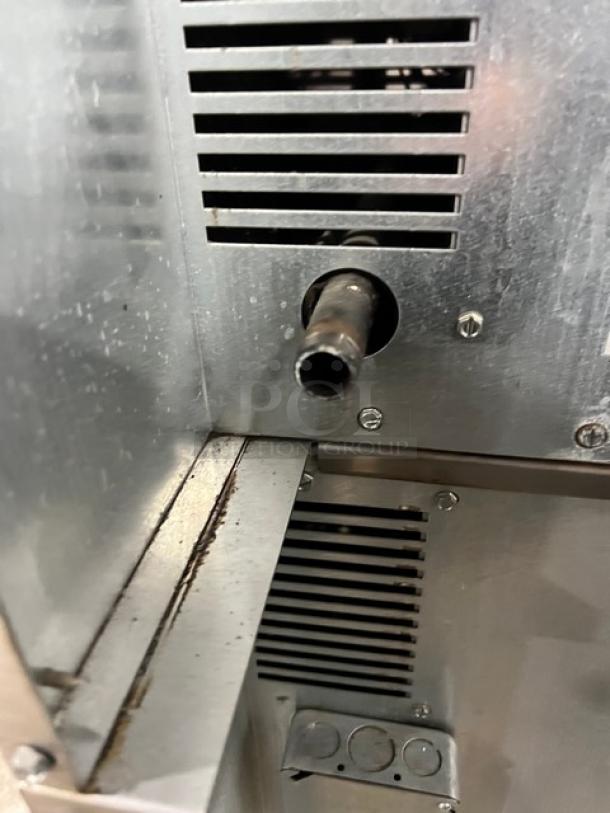 Imperial commercial double-stacked convection oven, stainless steel, natural gas, on casters, includes wired rack.