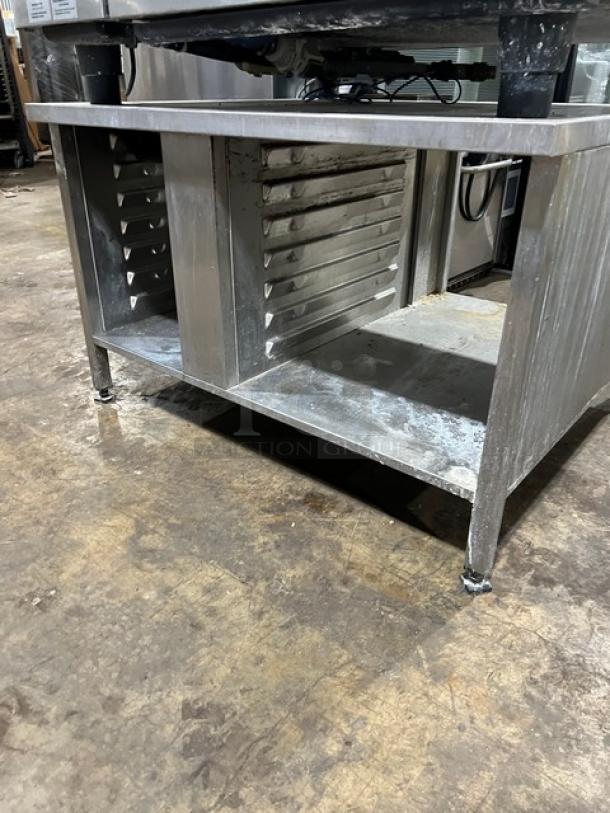 Rational SCCWE62G Self Cooking Center, stainless steel, natural gas, 6-pan capacity, with 2-section pan holding stand.