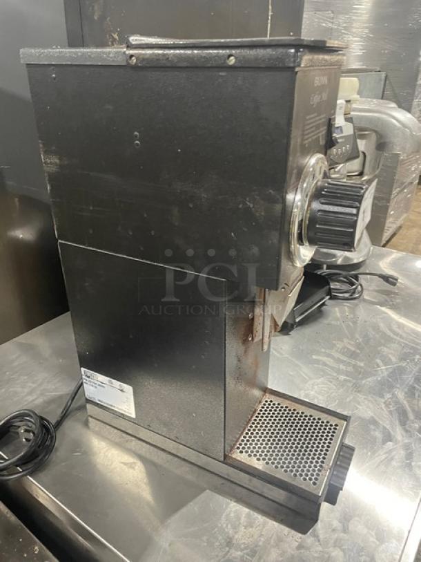 Bunn G1HD commercial coffee grinder, black, electric-powered, countertop model. Visible wear, power cord attached. 120V, 1 Phase.