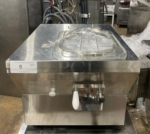 Commercial stainless steel ice cream machine, model ICM-12, electric powered, countertop, single-flavor, 110V, excellent condition.