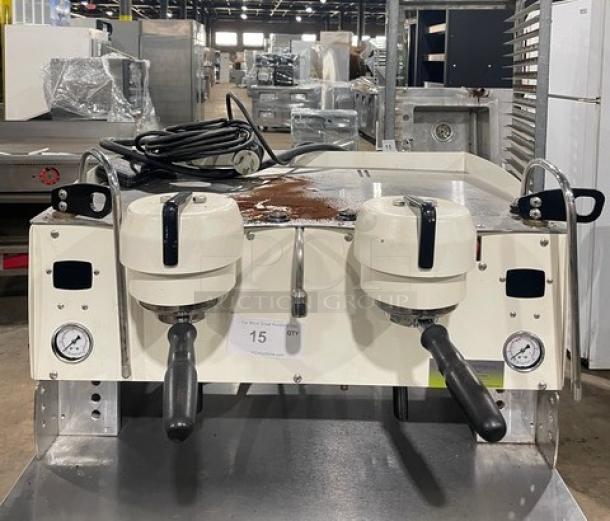 Synesso S200 Series, white, electric powered, two-group espresso machine with steam wand, visible dials.