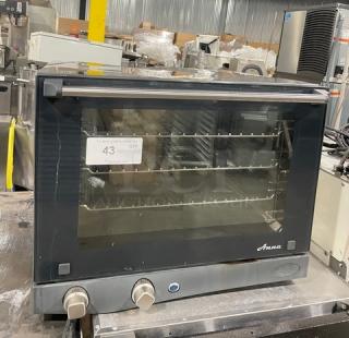 Cadco Anna Series XAF023 half-size convection oven, 240V, with wired rack, on legs, Model XAF023, SN: 2019B0013859.