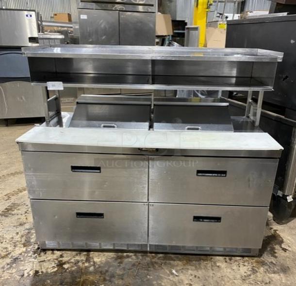 Commercial stainless steel refrigerated prep table with 4 drawers, bain marie style, enclosed overhead shelf, and cutting board.