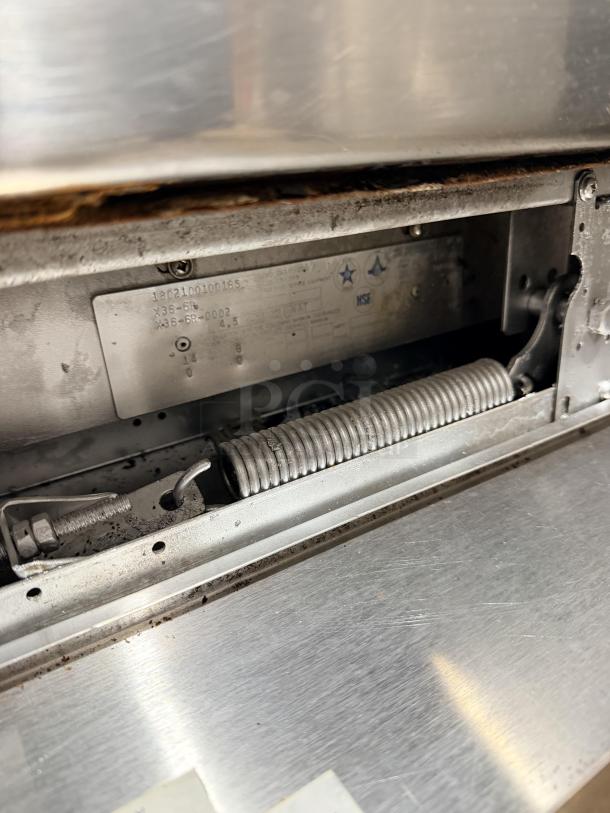 Garland SunFire X36-6R stainless steel 6-burner range/oven with overhead salamander and backsplash. Serial: 1802100100165.