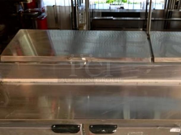 Beverage-Air DP67 pizza prep table, 67", stainless steel, refrigerated base, excellent condition, tested and working.