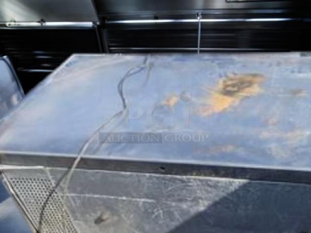 Commercial-grade chef base refrigerator with two drawers, 115V, U.S.-made, excellent condition, fully tested and working.