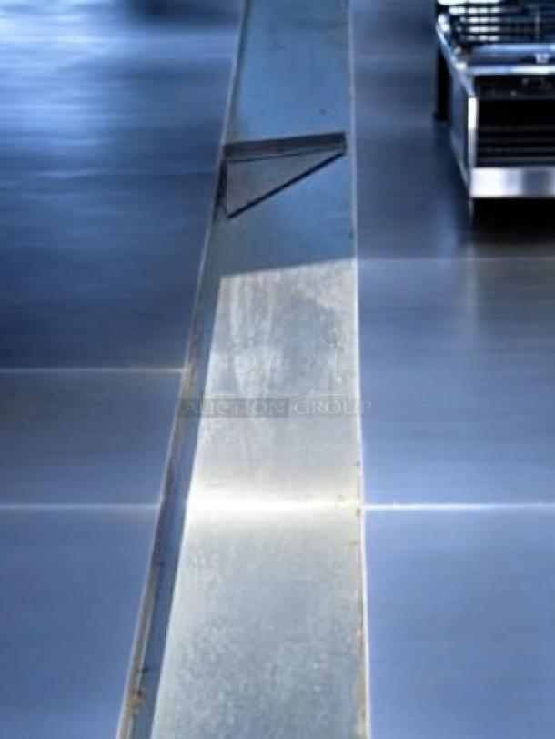 Stainless steel wall-mounted shelf in immaculate condition; heavy-duty commercial foodservice grade, model Wall-Mount Stainless Shelf.