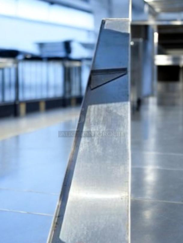 Stainless steel wall-mounted shelf in immaculate condition, heavy-duty commercial kitchen grade, fully tested, ready for use.