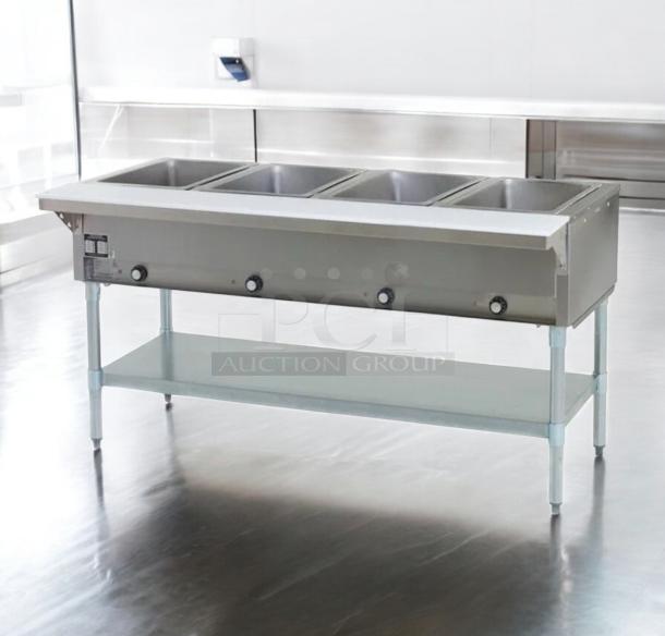 Great condition Duke E304SW electric steam table, 4 wells, infinite controls, 208V, fully tested, stainless steel.