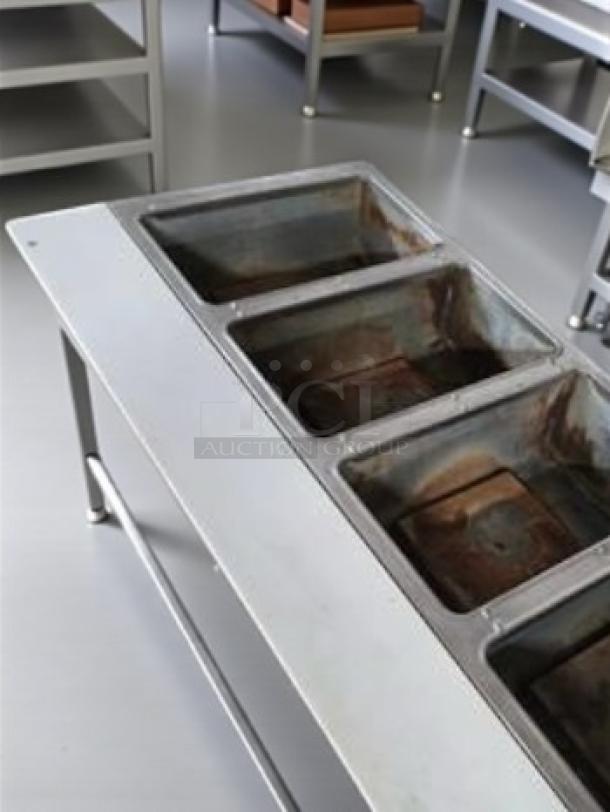 Duke E304SW electric steam table, four wells, stainless steel, 208V, great condition, infinite controls, fully tested.