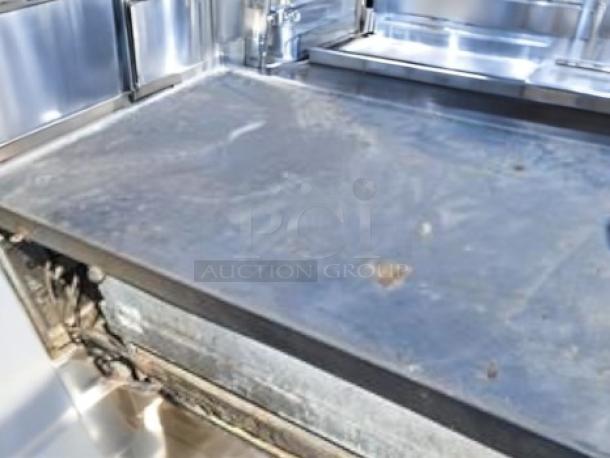 True TRCB-72 refrigerated chef base, 4 drawers, stainless steel, 115V, outstanding condition, fully tested and working.