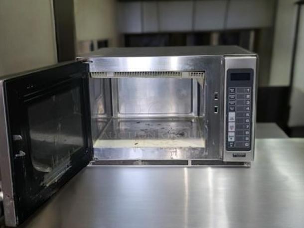 Amana RFS12MP heavy-duty commercial microwave, stainless steel, 120V, open door view, keypad controls, tested and working.