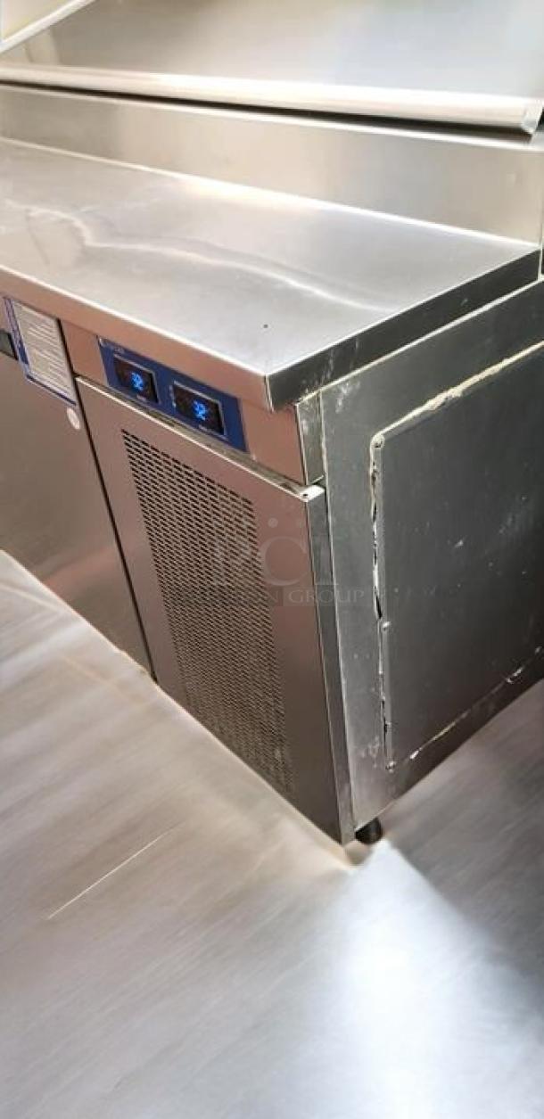 Turbo Air MST-48 2-door refrigerated prep table, in superb condition. Features stainless steel finish, 115V, tested and working.