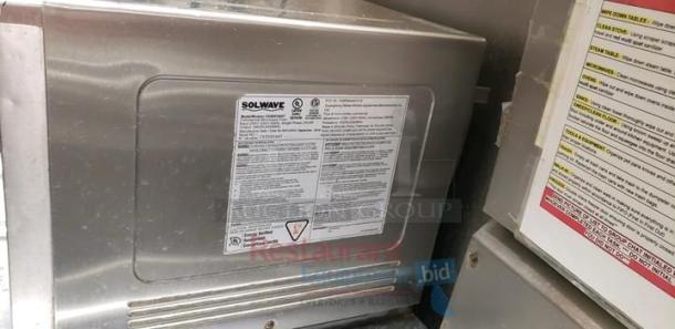 Solwave MW1000T commercial microwave, pristine condition, 120V, with manufacturer label visible. Made in USA, fully tested.
