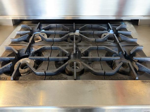 Connerton CR-6 six-burner gas range with oven, natural gas, labeled, outstanding condition, fully tested and working.