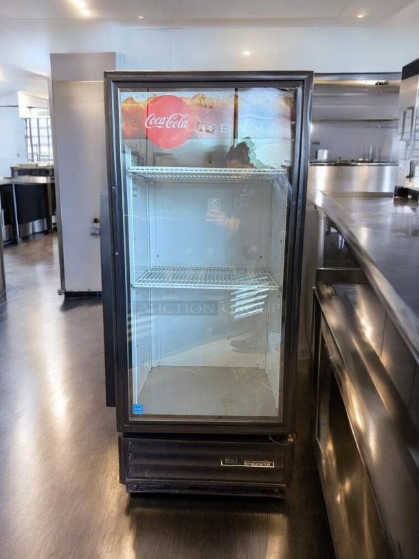 Top-tier True GDM-10-58-HC-LD Coca-Cola glass door display fridge. Excellent condition, fully tested, 115V, with branding.