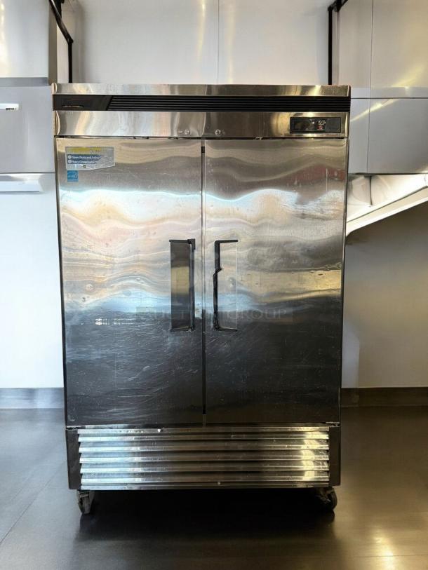 True T-49-HC double door reach-in refrigerator, superb condition, stainless steel, tested and working, 115V, model label visible.