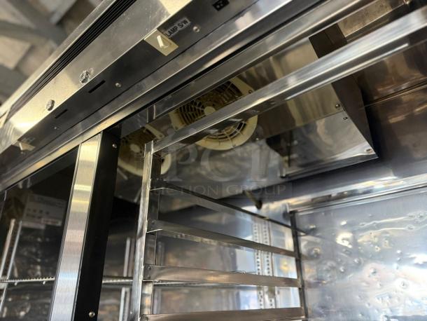 True T-49-HC double-door refrigerator interior; superb condition; stainless steel shelving and fan visible; "Lamp Sw" label.