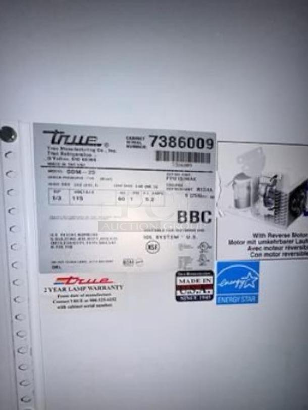 True GDM-23-HC-LD single glass door merchandiser, immaculate condition, tested and working, 115V, model tags visible.