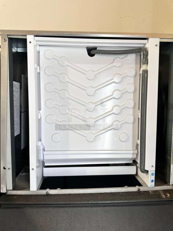 Superb condition Ice-O-Matic CIM1136HA5 commercial ice maker, air-cooled, with storage bin. Fully tested and working.