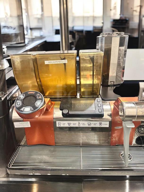 Schaerer Coffee Art Plus super automatic espresso machine in outstanding condition, fully tested, 208-240V, with control panel and dispensing units visible.