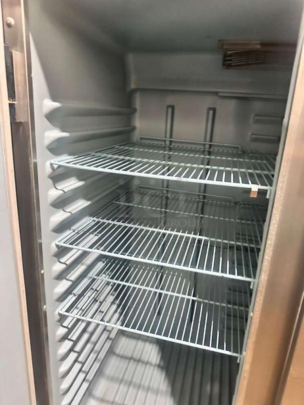 Delfield 6000XL double door freezer interior with four wire shelves, superb condition, fully tested and working.
