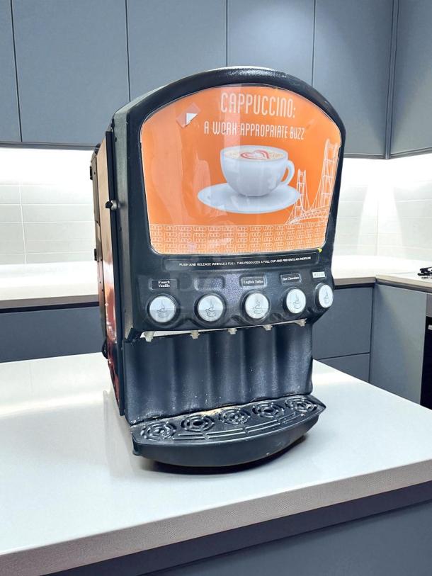 Grindmaster PIC5, 5-flavor hot beverage dispenser, superb condition, tested, 120V, labeled for cappuccino, black and orange design.