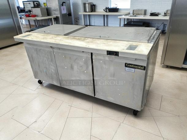 Continental SW72-30M prep table, 72" wide, three-door, stainless steel, tested and working, minor surface wear.