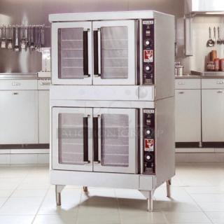 WOLF WKGD-2 double deck gas convection oven in excellent condition; includes control panels and clear viewing windows.