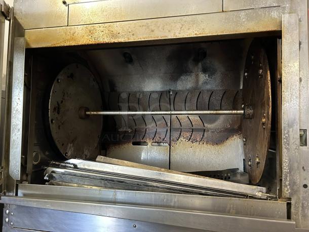 HARDT Inferno 4500 double-stacked gas rotisserie oven in excellent condition, fully tested, with visible interior and racks.