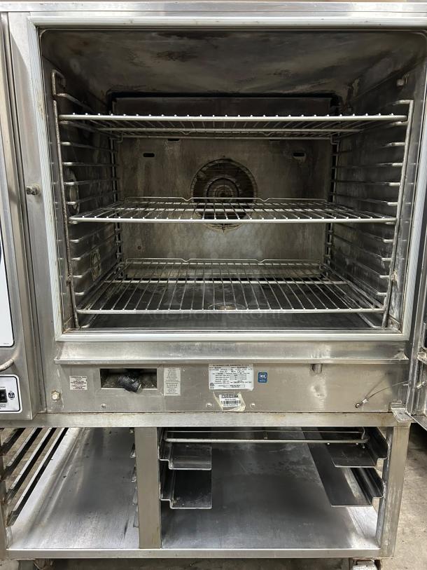 Blodgett BX-14G-NAT natural gas combi oven, excellent condition, tested and working, with manual controls and stainless steel exterior.