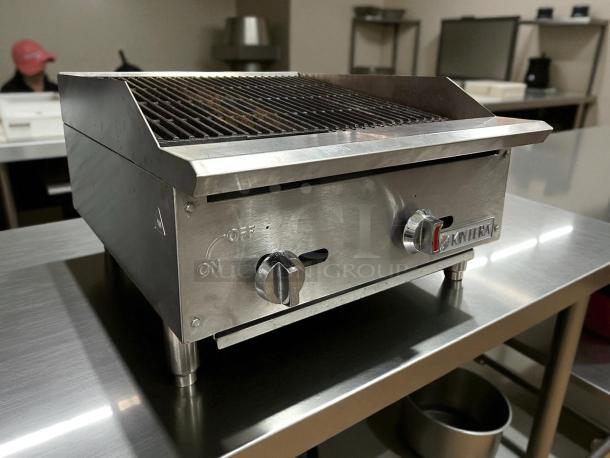 Kintera KCBR24 24" gas countertop charbroiler, stainless steel, 2 burners, tested, working condition, visible branding.