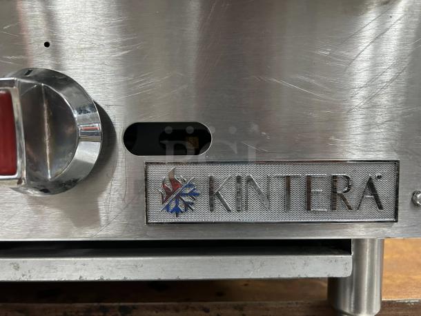 Kintera KCBR24 24" Gas Charbroiler, 2 burners, stainless steel, excellent condition, logo and control knob visible.