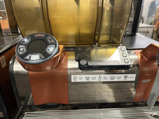 Starbucks Thermoplan Mastrena II espresso machine, fully tested, with external pump, controls, and labeling visible.