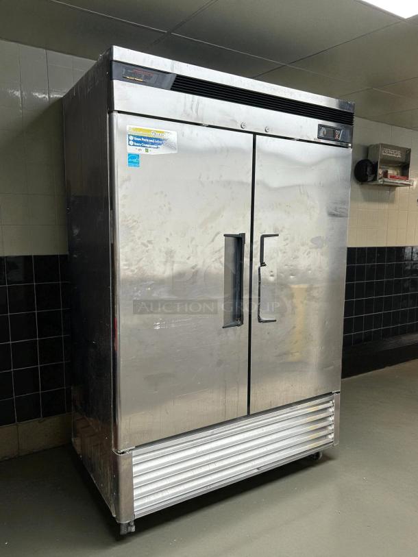 Turbo Air TSF-49SD-N Super Deluxe 54" solid door reach-in freezer, stainless steel, tested and working, scuff marks visible.