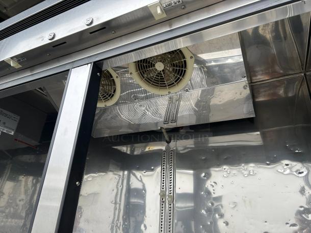 Turbo Air TSF-49SD-N Super Deluxe 54" reach-in freezer interior. Visible fans and stainless steel surfaces, tested and working.