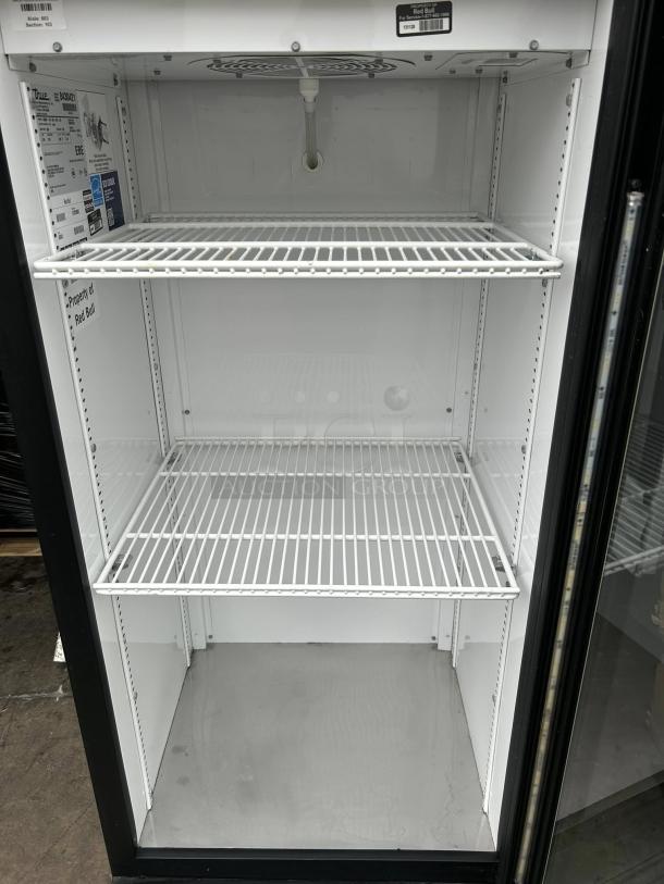True GDM-10-58-HC~TSL01 merchandiser, black, glass door, excellent condition, tested, right hinge, 24 7/8", 115v.