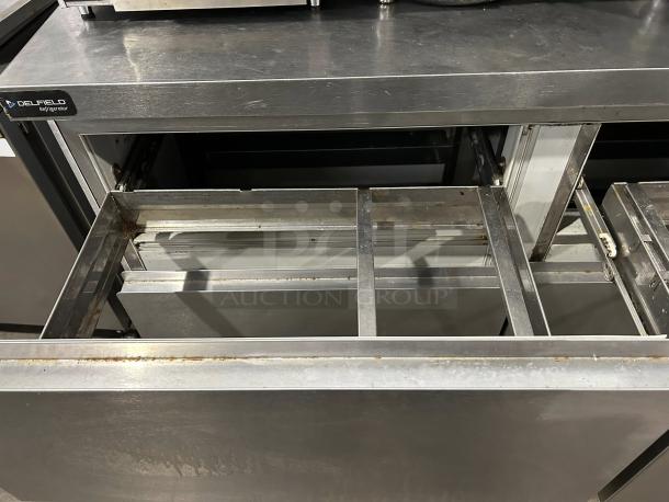 Delfield GUR60BP-D 4-Drawer WorkTop Refrigerator, excellent condition, stainless steel, tested and working, visible branding.