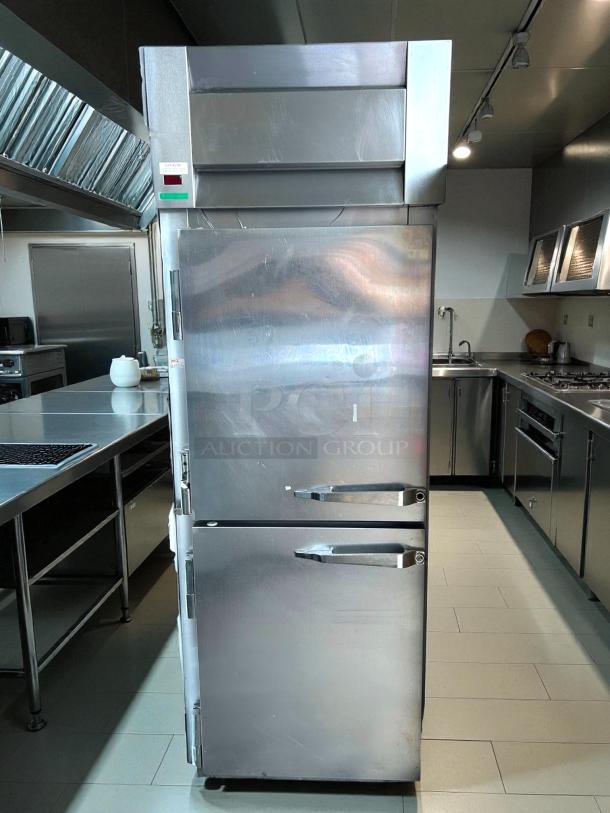McCall Model 1-102001 single split door reach-in refrigerator, stainless steel, tested and working, commercial kitchen setting.