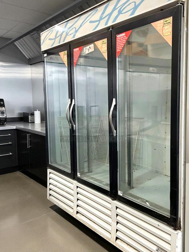 Beverage-Air CRG74-1 refrigerated merchandiser, 78", three-section glass door, tested, working, used condition.