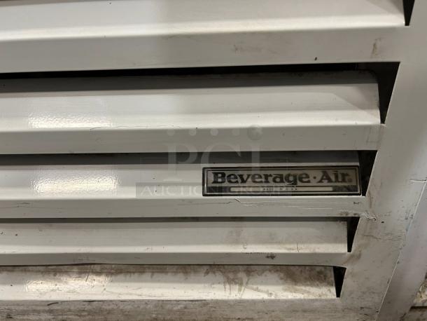 Beverage-Air CRG74-1 label on glass door refrigerated merchandiser. Shows brand logo and "Made in USA" marking.