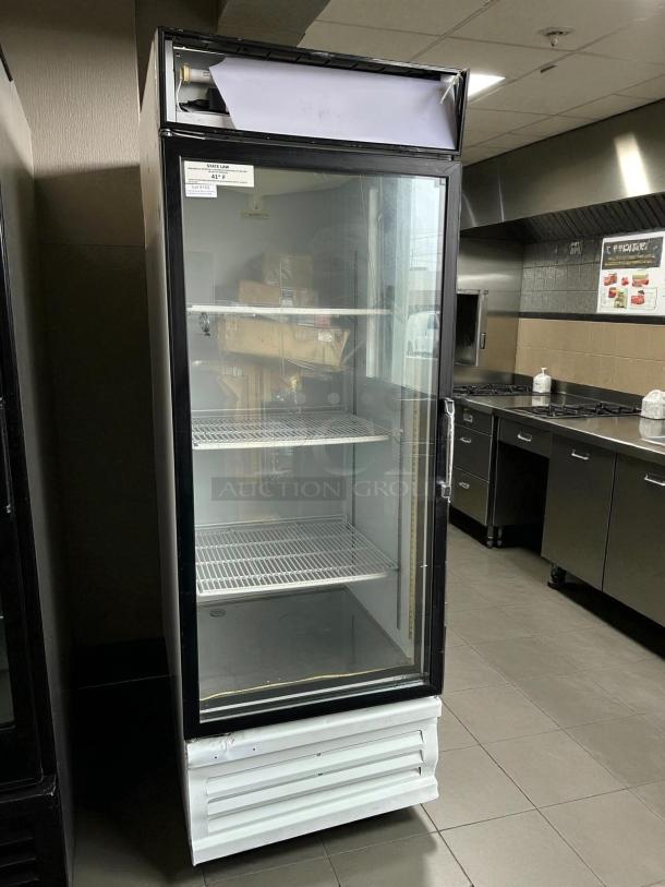 Everest Refrigeration EMGR24 28-inch reach-in fridge with glass door, tested and working, visible interior shelves, clean condition.