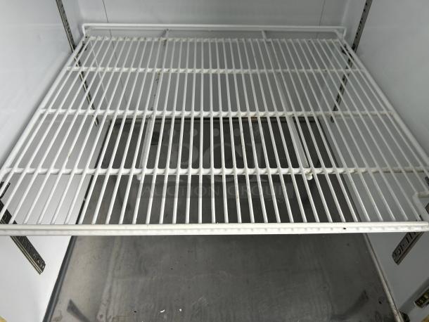 Everest Refrigeration EMGR24, 28-inch reach-in model with glass door, shelving detail shown. Good condition, tested working.