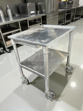 GSW all stainless steel equipment stand, perfect condition, with heavy-duty casters for easy swivel.