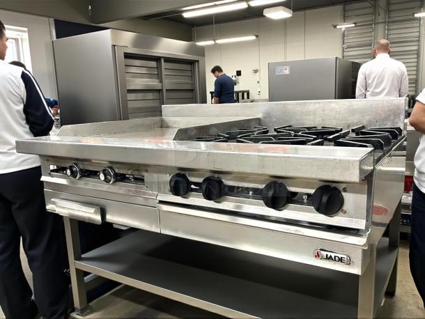 Jade Range countertop gas range with 24” griddle, 4 burners, in excellent condition; features sturdy knobs and Jade label.