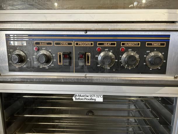 NU-VU QB-3/9 double deck oven proofer combo in excellent condition. Features control panel with bake, proofer, heat, humidity, and timer knobs.
