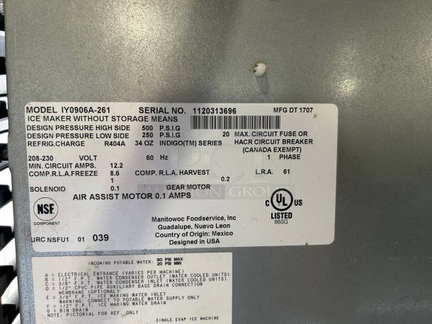 Manitowoc Ice IY-0906A 30" Indigo™ half cube ice machine label showing specifications: model, serial number, voltage.