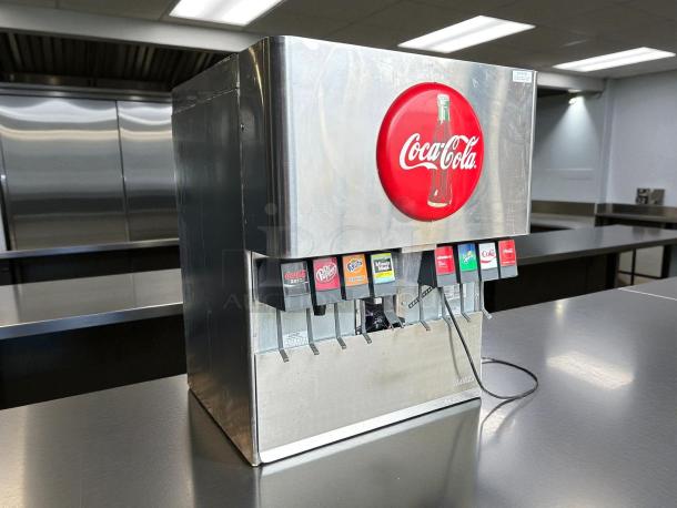 LANCER 4500-30 soda dispenser with ice combo, 30” wide, offering 8 drink options. Stainless steel, tested, working condition.